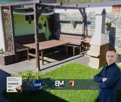 **Großzügige 4-Zimmer-Wohnung mit Balkon, Kamin und Garten in ruhiger Lage**