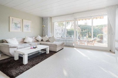 Attraktiver Reihenbungalow mit Vollkeller, Wintergarten, Kamin, Einzelgarage und viel Komfort
