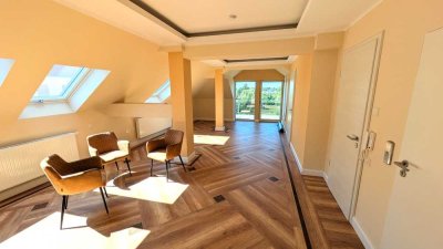 exklusive und klimatisierte 2-Raum-DG-Wohnung