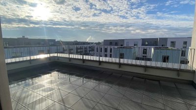 Effizientes Penthouse mit umlaufender Dachterrasse und Weitblick ins Grüne