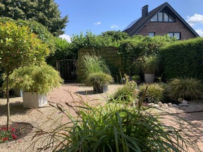Attraktive 3-Zimmer-Wohnung mit eigenem Garten in ruhiger Lage im Ortszentrum von Alpen zu vermieten