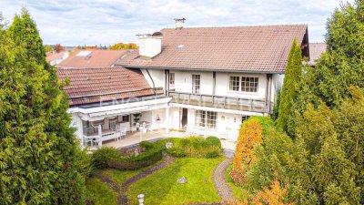 Charmantes Anwesen mit Ausbaupotenzial in bester Lage