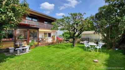 Für Gartenliebhaber! 
Ruhig & sonnig gelegene 
3-4 Zi.-Erdgeschosswohnung mit Wintergarten & Garag