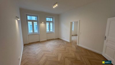 Großzügiger Altbaucharme trifft moderne Sanierung – 3,5-Zimmer-Erstbezug mit Balkon.