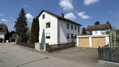 Zweifamilienhaus mit Garten und Garage zu verkaufen