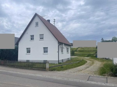Modernisierungsbedürftiges Einfamilienhaus mit Einliegerwohnung in ruhiger Lage