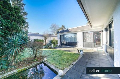 **Begehrter Winkel-Bungalow bietet viel Privatsphäre & Potenzial in Köln-Rondorf**