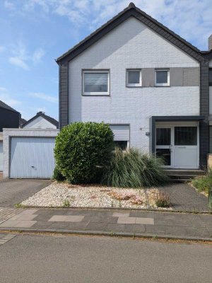 SCHICKES REIHENENDHAUS MIT HÜBSCHEM GARTEN UND GARAGE IN KINDERFREUNDLICHER LAGE