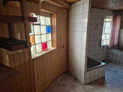 Sanierungsbedürftiges Mehrfamilienhaus mit hohem Entwicklungspotenzial – Ihr ideales Investment!