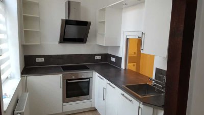 Exkl. 2,5 Zi. WE im EG (Stadtzentrum), EBK, G-WC, Terrasse, Stellpl. a. Haus, sucht solventen Mieter