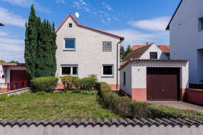 Jung & Kern Immobilien - Charmantes Einfamilienhaus mit großem Potenzial in zentraler Lage