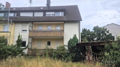 Sanierungsbedürftiges Mehrfamilienhaus in ruhiger Lage mit großem Grundstück!