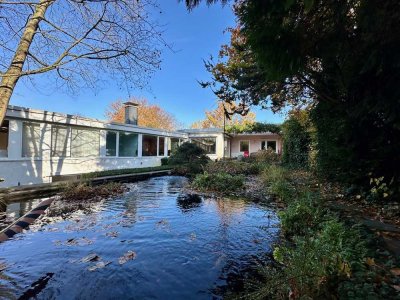 Ein Haus wie kein anderes – stilvolle Wohn-Oase mit Gartenidylle und viel Privatsphäre