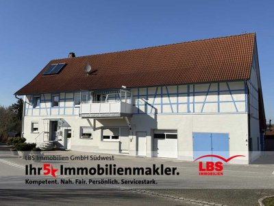 Gepflegtes Wohnhaus mit Gewerbehallen und großem Grundstück