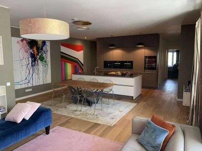 Wohnen am See – Stilvolle Gartenwohnung mit moderner Architektur