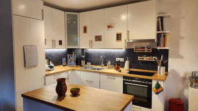 Schöne, helle 4 ZKB EG-Whg mit Garten