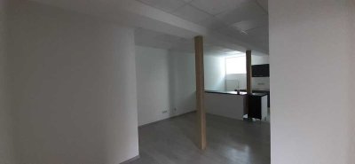 Zweizimmerwohnung mit Wohnküche und Schlafzimmer.