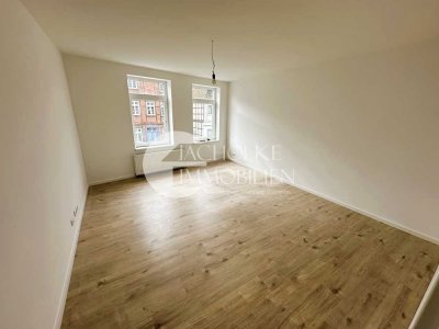 Modernisierte 3-Zimmer-Wohnung im denkmalgeschützten Fachwerkhaus, zentral in Bergen