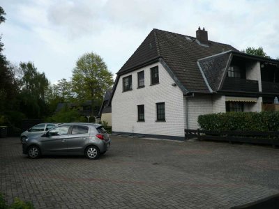 Helle 2-Zimmer Wohnung mit Terrasse und kleinem Garten in einem vier Parteienhaus