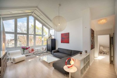 KENSINGTON - Exklusiv - Lichtdurchflutete Dachgeschosswohnung mit beeindruckender Fensterfront