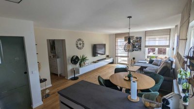 Geschmackvolle Wohnung mit drei Zimmern sowie Balkon,TG und EBK in Nehren