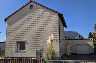 1450 Ruhiges, freistehendes Einfamilienhaus mit Wintergarten und Garage in Münchweiler an der Alsenz