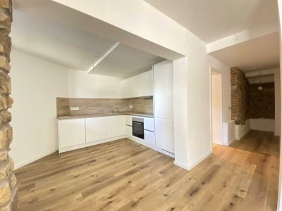 Erstbezug! Sanierte 2-Zimmer-Souterrain-Wohnung in ruhiger Wohnlage