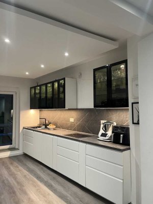 Moderne 4-Zimmer-Terrassenwohnung mit Einbauküche, Garage + einiges mehr