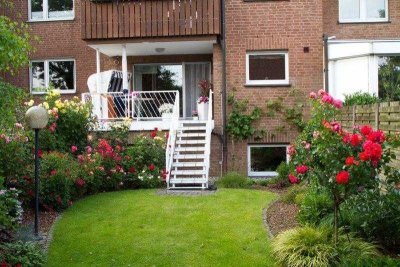 Lichtdurchflutete Maisonette-Wohnung mit Terrasse und eigenem Garten