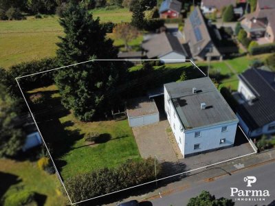 Sanierungsbedürftiges Einfamilienhaus mit Baugrundstück und Doppelgarage in Hürtgenwald-Bergstein