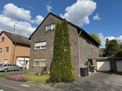 Quadrath-Ichendorf, voll vermietetes Dreifamilienhaus, Erdgeschosswohnung mit Garten, 2 Garagen