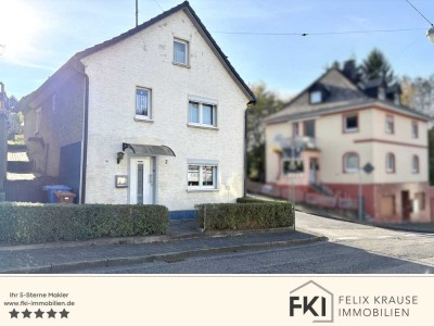 **Schönes Einfamilienhaus mit Garten und Garage in Kirchen**