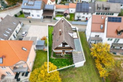 Im Bieterverfahren: Einfamilienhaus mit Potenzial in hervorragender Lage