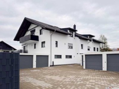 NEUBAU-ZWEITBEZUG - Sonnige Dreizimmerwohnung in idealer Lage mit  Kellerraum und Einzelgarage