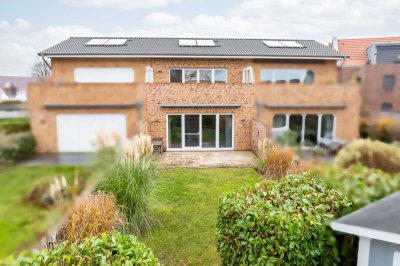 Neuwertiges Reihenhaus mit Dachterrasse und Sauna in begehrter Lage, wenige Gehminuten zum Strand