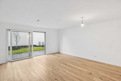 moderne lichtdurchflutete Erdgeschosswohnung mit kleinem Gartenanteil - Erstbezug