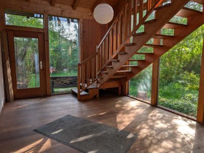 3-Zimmer Wohnung mit Wintergarten und großem Garten
