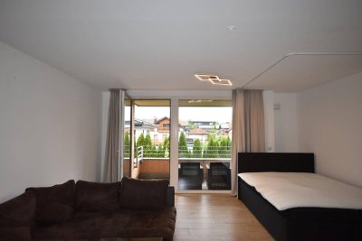 "GRÖDIG - Modernes und geräumiges Appartement mit großer Loggia und Bergblick"