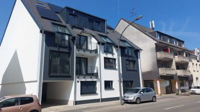 Vermietet! Top geschnittene 2 Zi.- Whg., Aufzug, Balkon, Stellplatz auf Wunsch / E- Ladestation