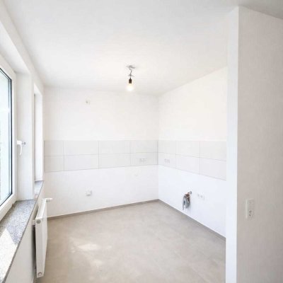 Teilmodernisierte 2-Zimmer-Wohnung mit eigenem Gartenbereich in Remscheid-Lüttringhausen