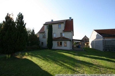 Einfamilienhaus mit Wintergarten, Kaminofen und historischem Nebengebäude