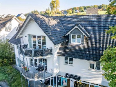 Nümbrecht-Winterborn - Helle Dachgeschosswohnung mit Balkon
