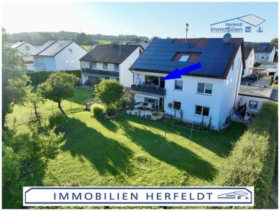 Exklusive Kapitalanlage: Stilvolle 3-Zimmer-Wohnung mit Südbalkon, Garten, Garage & Stellplätzen