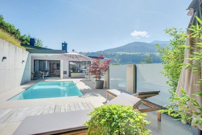 Penthouse-Erlebnis mit Pool und Sauna - traumhafter Bergblick inklusive!