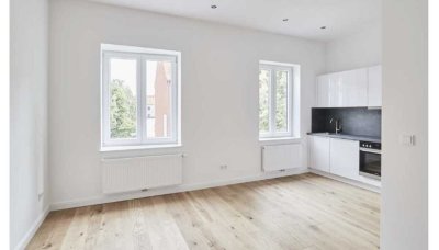 Zentrale 2-Zimmer Wohnung nach hochwertiger Sanierung mit Einbauküche und Waschmaschine