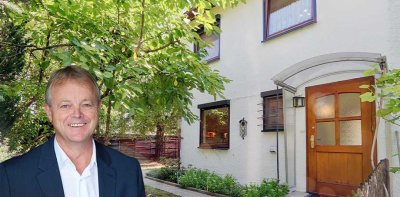 Reiheneckhaus mit großem Grundstück und Garage im beliebten Wohngebiet Storlach
