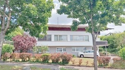 6-Zi.-Einfamilienanwesen, Bj. 1965 mit 285 m² Wfl./Nfl, gepflegter Zustand, EBK und Garage für 2 PKW