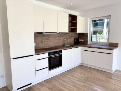 2-Zimmer-Gartenwohnung mit Einbauküche und sonniger Loggia!