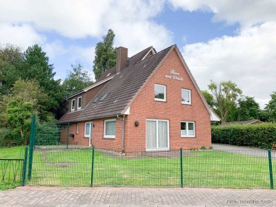 Moderne, große 3-Zimmer-Wohnung mit ca. 126 m² Wohnfläche, 2 Terrassen, Garten und Carport in ruhige