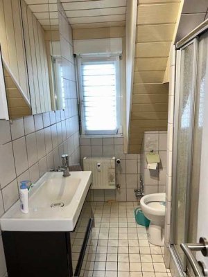 Helle Dachgeschosswohnung mit Einbauküche!